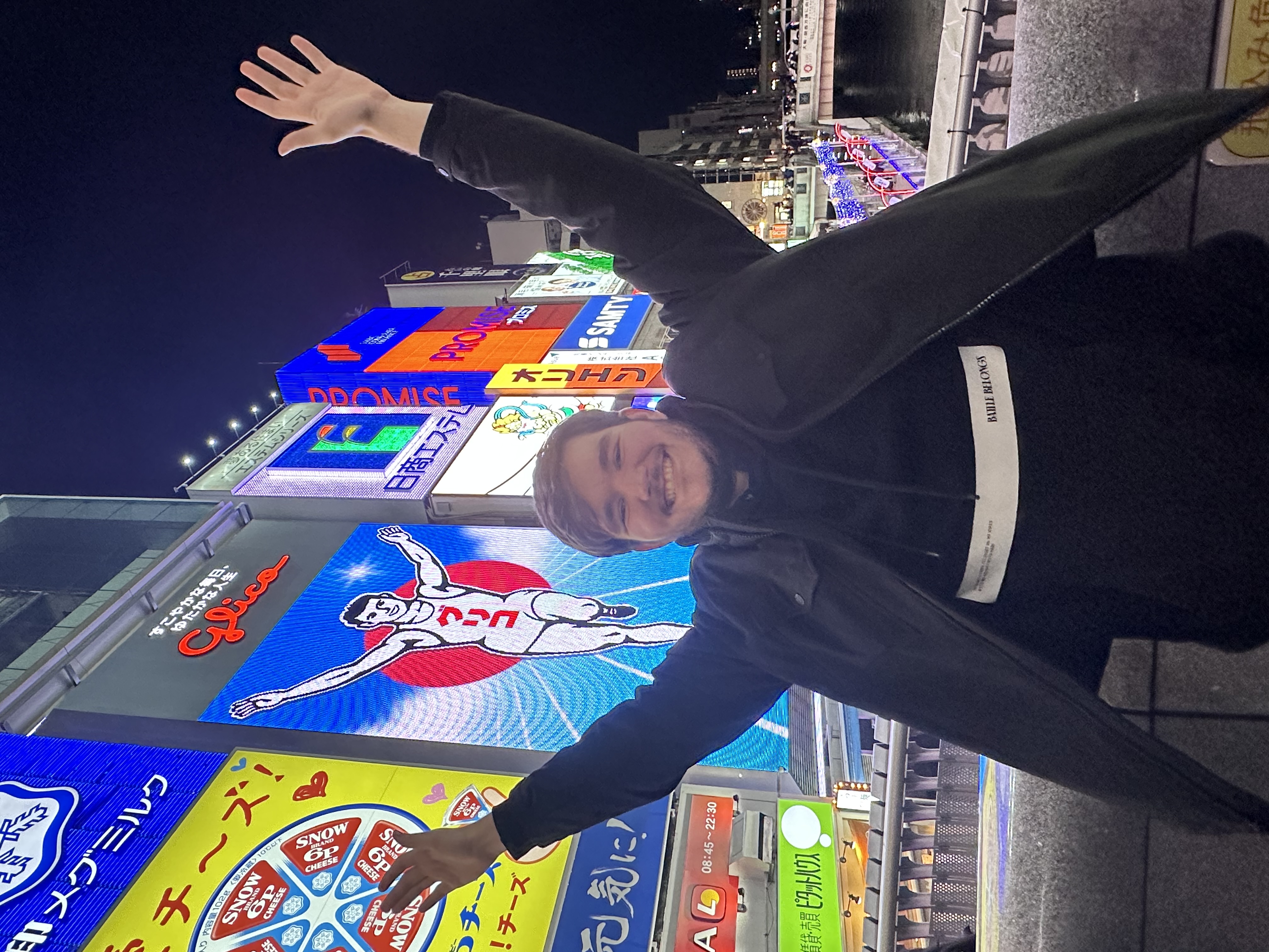 A photo of me in front of Osaka's "The Glico Running Man"